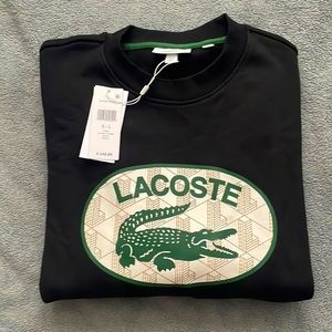 Lacoste black pull over sweatshirt with monogram logo, size L